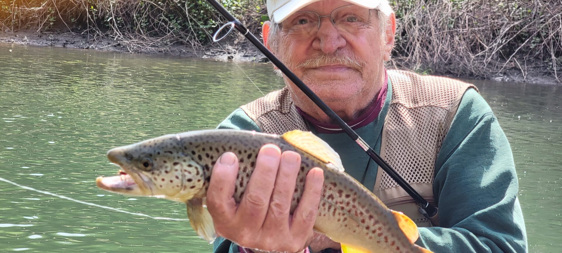Fred Hollar with Fresh Caught Brown Trout from Pine Creek